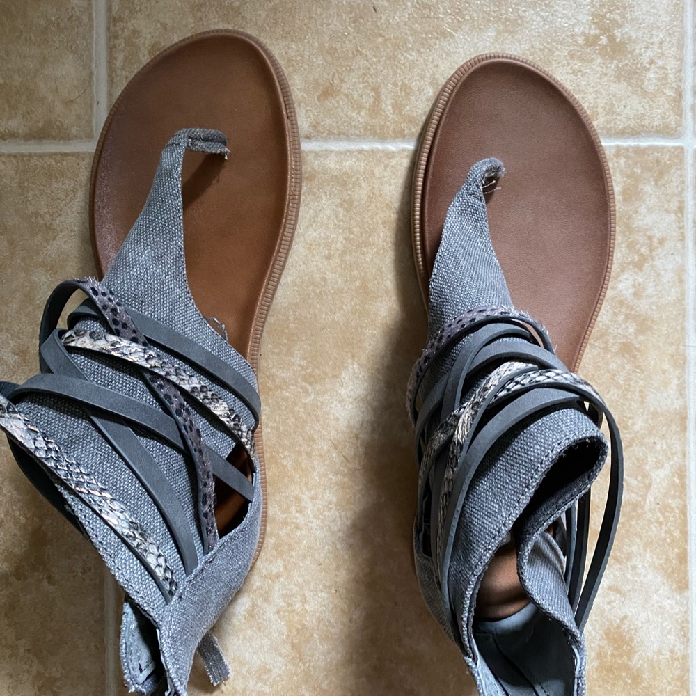 Brand new, never worn Size 11 gray sandals.
